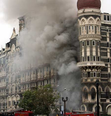 Smoke+engulfs+the+Taj+Hotel+in+Mumbai+on+Saturday,+November+29,+2008.+Commandos+killed+the+three+terrorists+holed+up+inside+and+reclaimed+the+historic+building+after+a+59-hour+gunbattle.jpg
